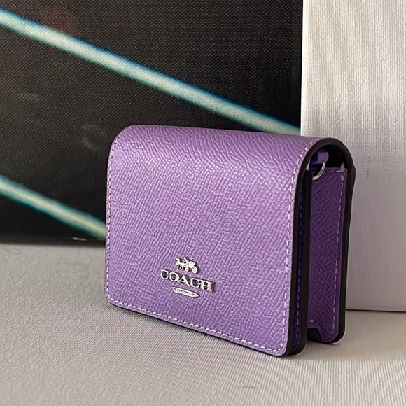 Coach 
MINI WALLET ON A CHAIN WITH SIGNATURE CANVAS INTERIOR - Picture 1 of 8